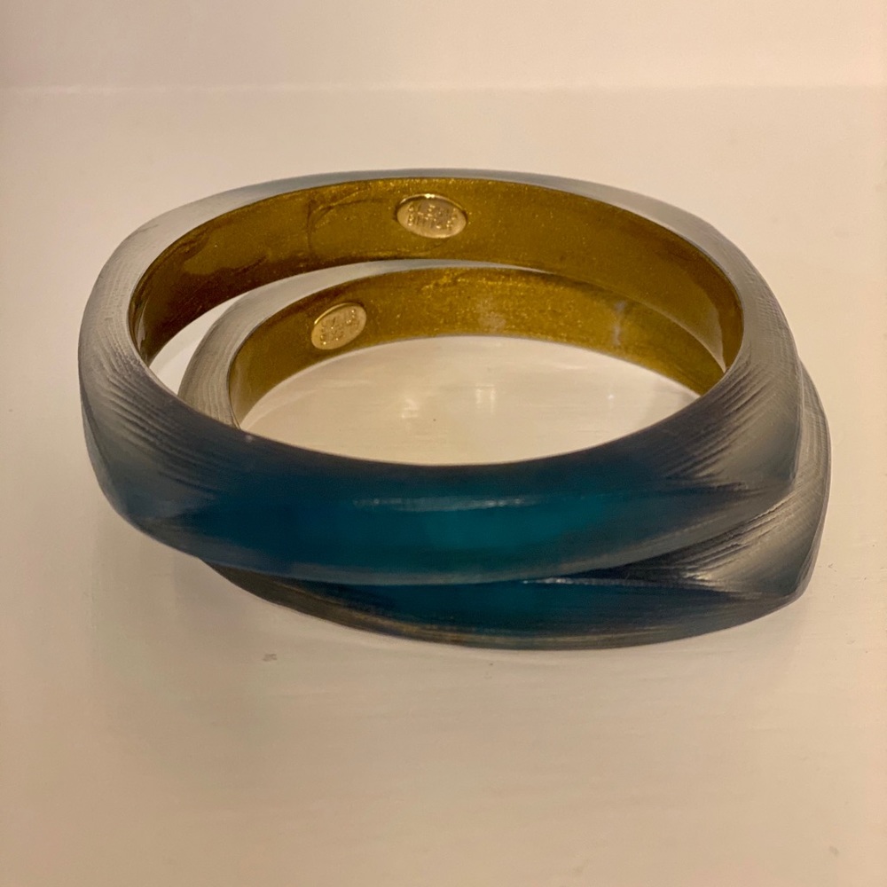 Two Alexis Bittar lucite Soft Square bangles.